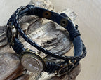 Armband-mehrsträngig, Schiffslenkrad, schwarz, Symbol Lakhovsky MWO Schwingkreis Oszialltor Antenne (stromlos), weiße Disc gold legiert + Kupfer unterlegt ca. 18 mm hinter Glas,Druckknopf Verschluss