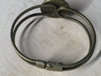 Armband - Lakhovsky MWO Antenne (stromlos) als nachtschwarzer ca. 25 mm großer Coin mit Goldlegierung in ein bronzefarbendes Schnapparmband eingearbeitet, Kupfer unterlegt