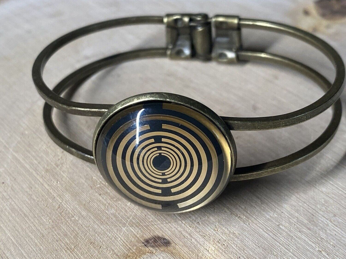Armband - Lakhovsky MWO Antenne (stromlos) als nachtschwarzer ca. 25 mm großer Coin mit Goldlegierung in ein bronzefarbendes Schnapparmband eingearbeitet, Kupfer unterlegt