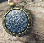 Amulett – bronzefarben, Dodecagram 12 – er Stern, Disc in schwarz 25 mm, zinnlegiert, kupferunterlegt – Produktansicht 1
