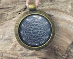 Amulett – bronzefarben, Dodecagram 12 – er Stern, Disc in schwarz 25 mm, zinnlegiert, kupferunterlegt – Produktansicht 1