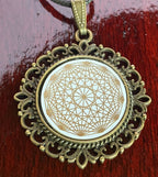 Amulett – Dodecagram als weisser 25 mm Coin – Dodecagram – 25 mm / goldlegiert / Fassung bronzefarben – Produktansicht 1