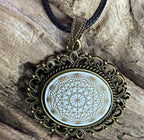 Amulett – Dodecagram als weisser 25 mm Coin – Dodecagram – 25 mm / goldlegiert / Fassung bronzefarben – Produktansicht 1