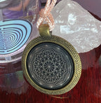 Amulett – Dodecagram als schwarzer 25 mm Coin – Dodecagram – 25 mm / zinnlegiert / Fassung bronzefarben – Produktansicht 1