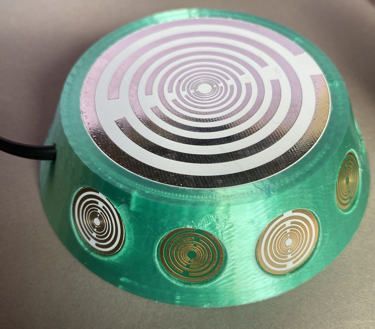 69 mm VibraNex UFO, 1-farbig, Oberflächenplatte zinnlegiert – Produktansicht 1