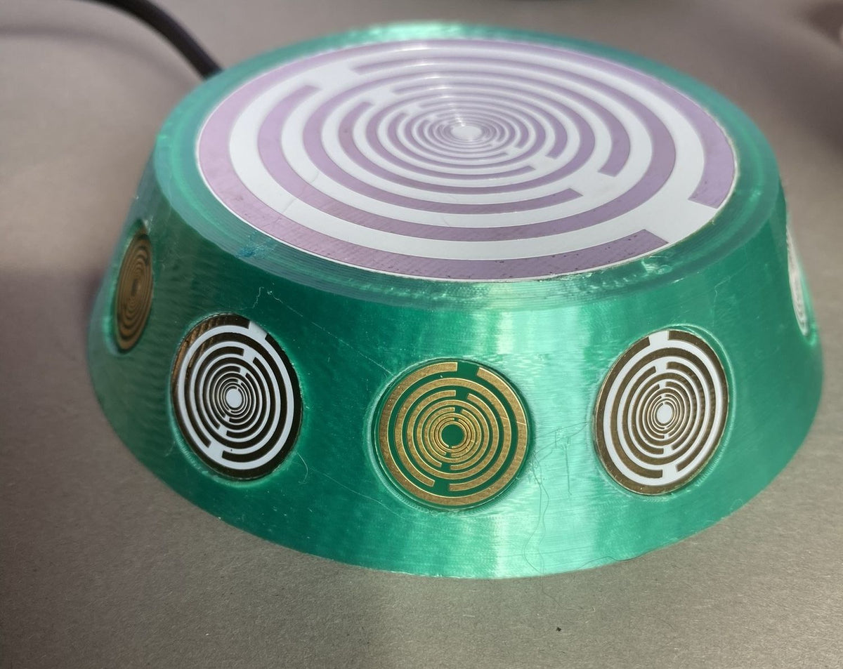 69 mm VibraNex UFO, 1-farbig, Oberflächenplatte zinnlegiert – Produktansicht 1