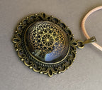 Amulett – bronzefarben, Dodecagram 12 – er Stern, Disc in schwarz 25 mm, goldlegiert, kupferunterlegt – Produktansicht 1