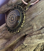 Amulett – bronzefarben, Dodecagram 12 – er Stern, Disc in schwarz 25 mm, goldlegiert, kupferunterlegt – Produktansicht 1
