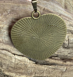 Amulett – bronzefarben, Lakhovsky MWOn Symbol, Disc in weiß 25 mm, goldlegiert, kupferunterlegt – Produktansicht 1