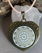 Amulett – bronzefarben, Lakhovsky MWOn Symbol, Disc in weiß 25 mm, goldlegiert, kupferunterlegt – Produktansicht 1