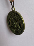 Amulett – bronzefarben, Wicca, Lakhovsky MWO, Disc in schwarz, goldlegiert, kupferunterlegt – Produktansicht 1