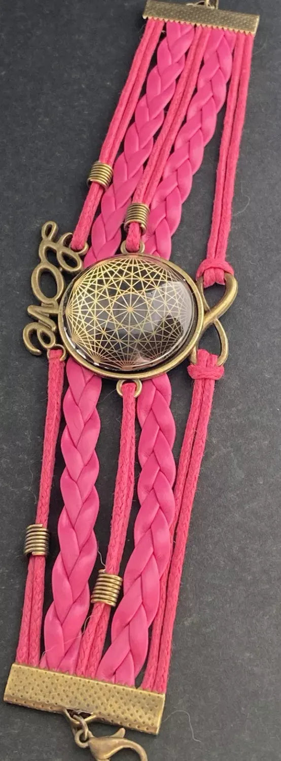 Armband - Dodecagram als nachtschwarzer ca. 25 mm großer Coin (hinter Glas) mit Goldlegierung in pinkes mehrsträngiges Band eingearbeitet