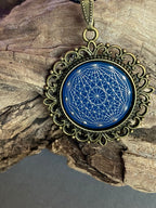 Amulett – bronzefarben, Dodecagram 12 – er Stern, Disc in blau 25 mm, zinnlegiert, kupferunterlegt – Produktansicht 1