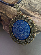 Amulett – bronzefarben, Dodecagram 12 – er Stern, Disc in blau 25 mm, zinnlegiert, kupferunterlegt – Produktansicht 1