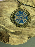Amulett – bronzefarben, Lakhovsky MWOn Symbol, Disc in blau 25 mm, zinnlegiert, kupferunterlegt – Produktansicht 1