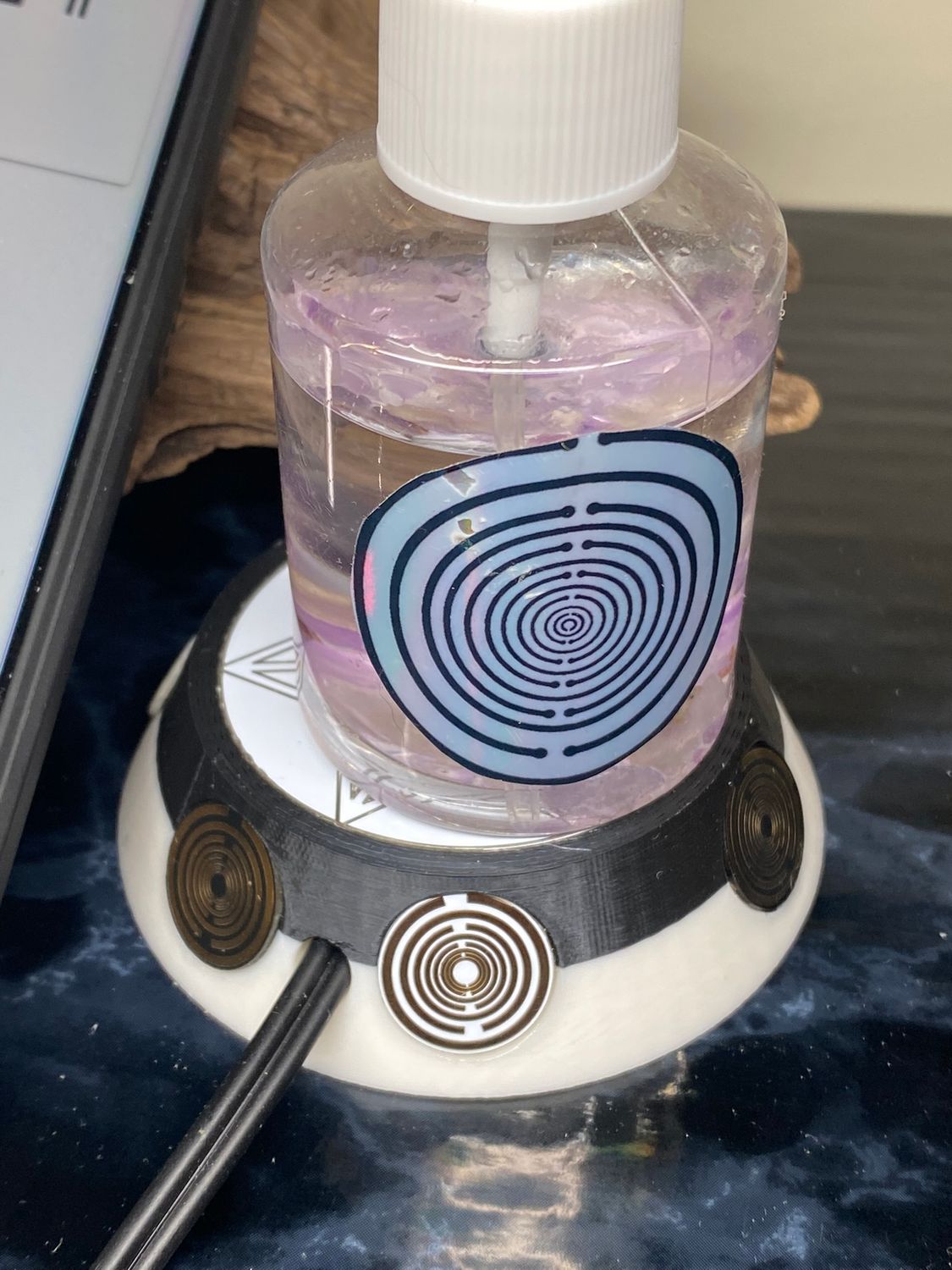 50 mm VibraNex UFO – 2-farbig, Oberflächenplatte zinnlegiert, Füllung Obsidian – Produktansicht 1