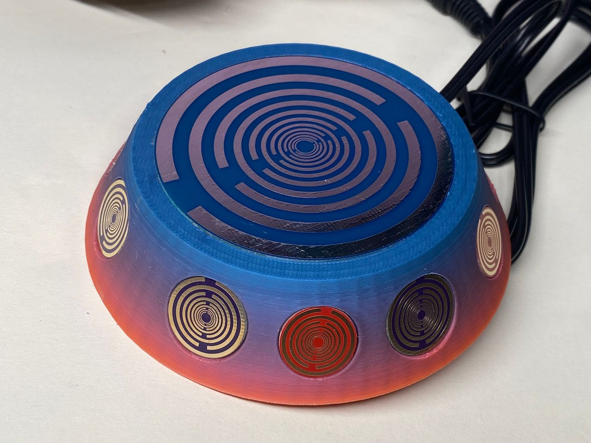 69 mm VibraNex UFO – Einhorn matt, Oberflächenplatte zinnlegiert – EINZELSTÜCK – Produktansicht 1