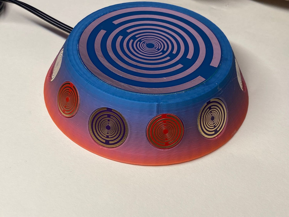 69 mm VibraNex UFO – Einhorn matt, Oberflächenplatte zinnlegiert – EINZELSTÜCK – Produktansicht 1