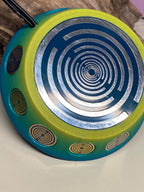 69 mm VibraNex UFO – Einhorn matt, Oberflächenplatte zinnlegiert – EINZELSTÜCK – Produktansicht 1